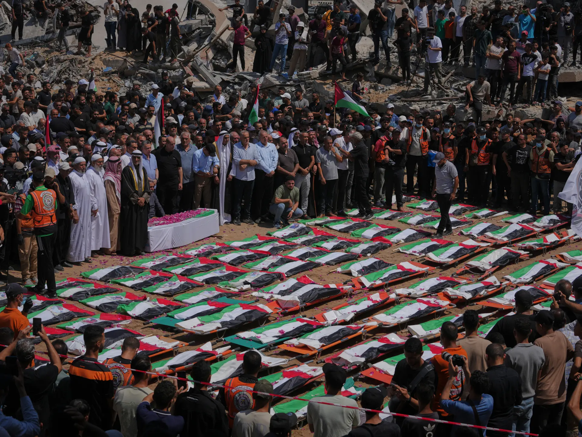 Photos: Thousands in Gaza City join mass funeral for 112 Palestinians