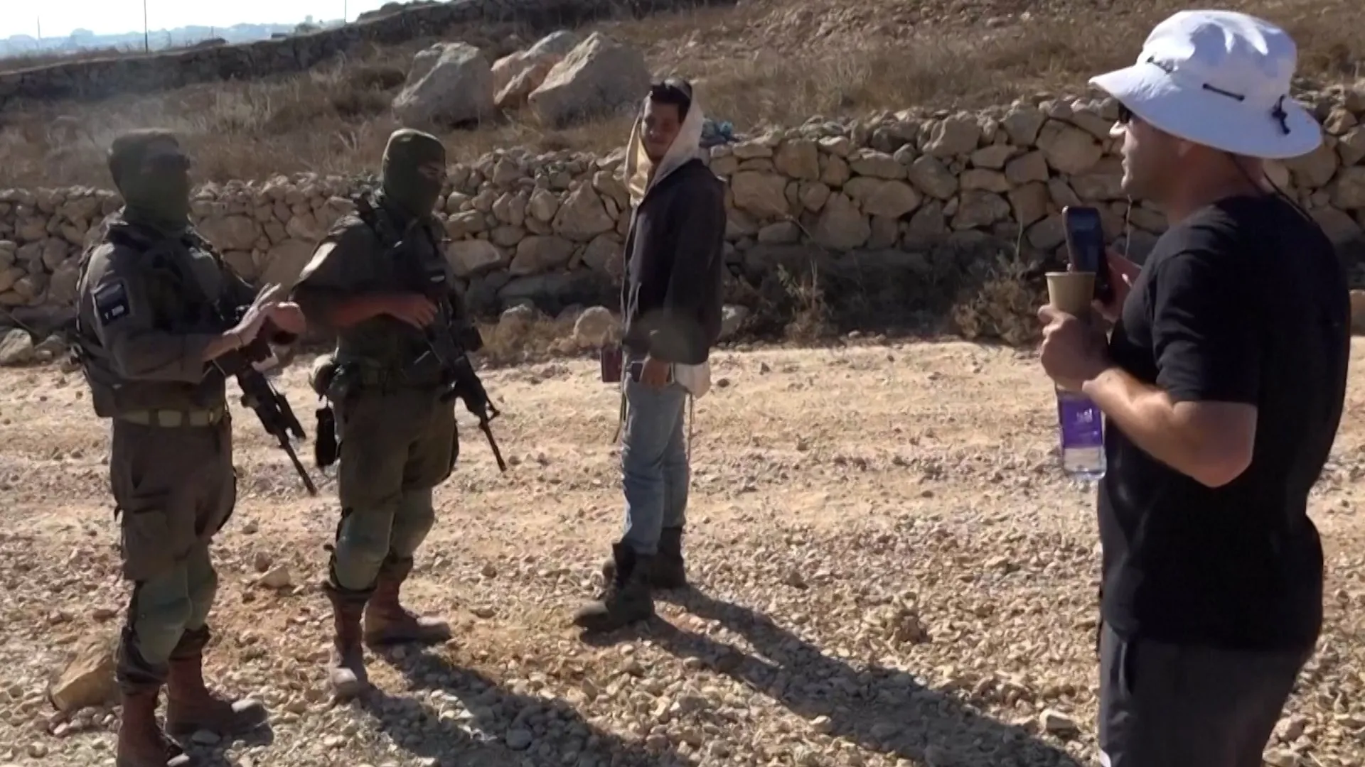 Palestinian-American confronts Israeli settler at his besieged home