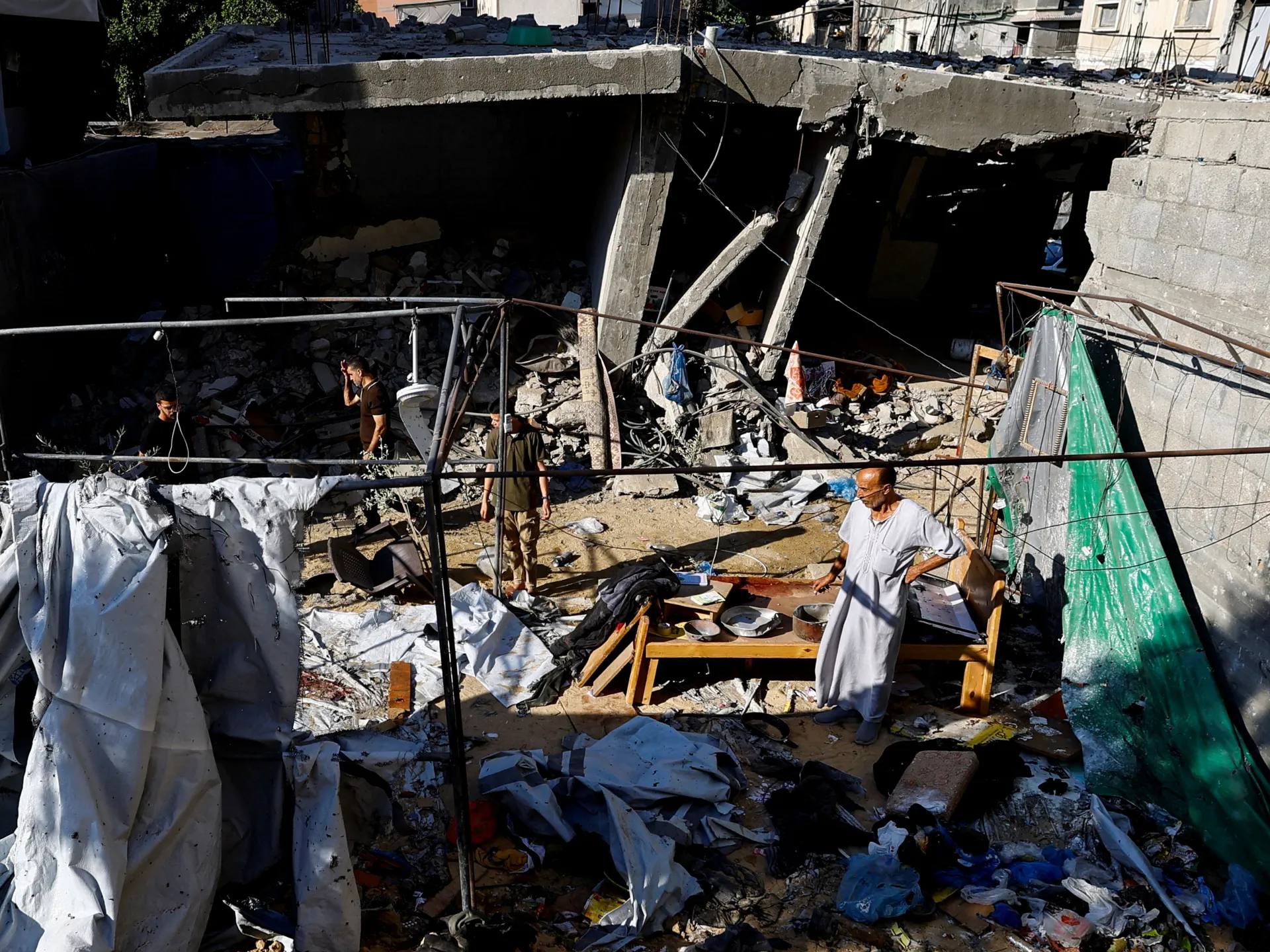 Israeli strike on Gaza shelter extends casualty list