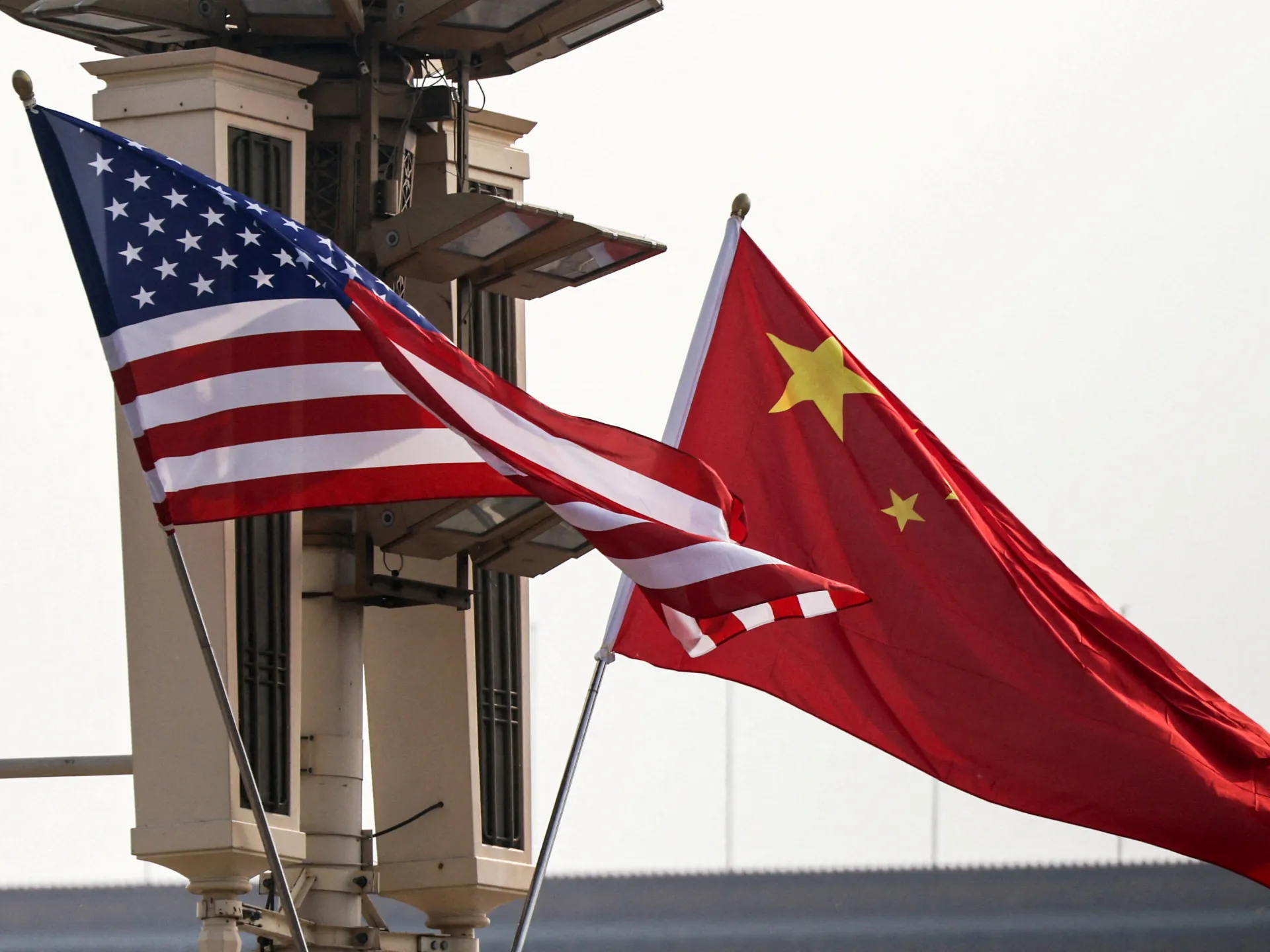 China says will safeguard its own interests as US expands Iran sanctions