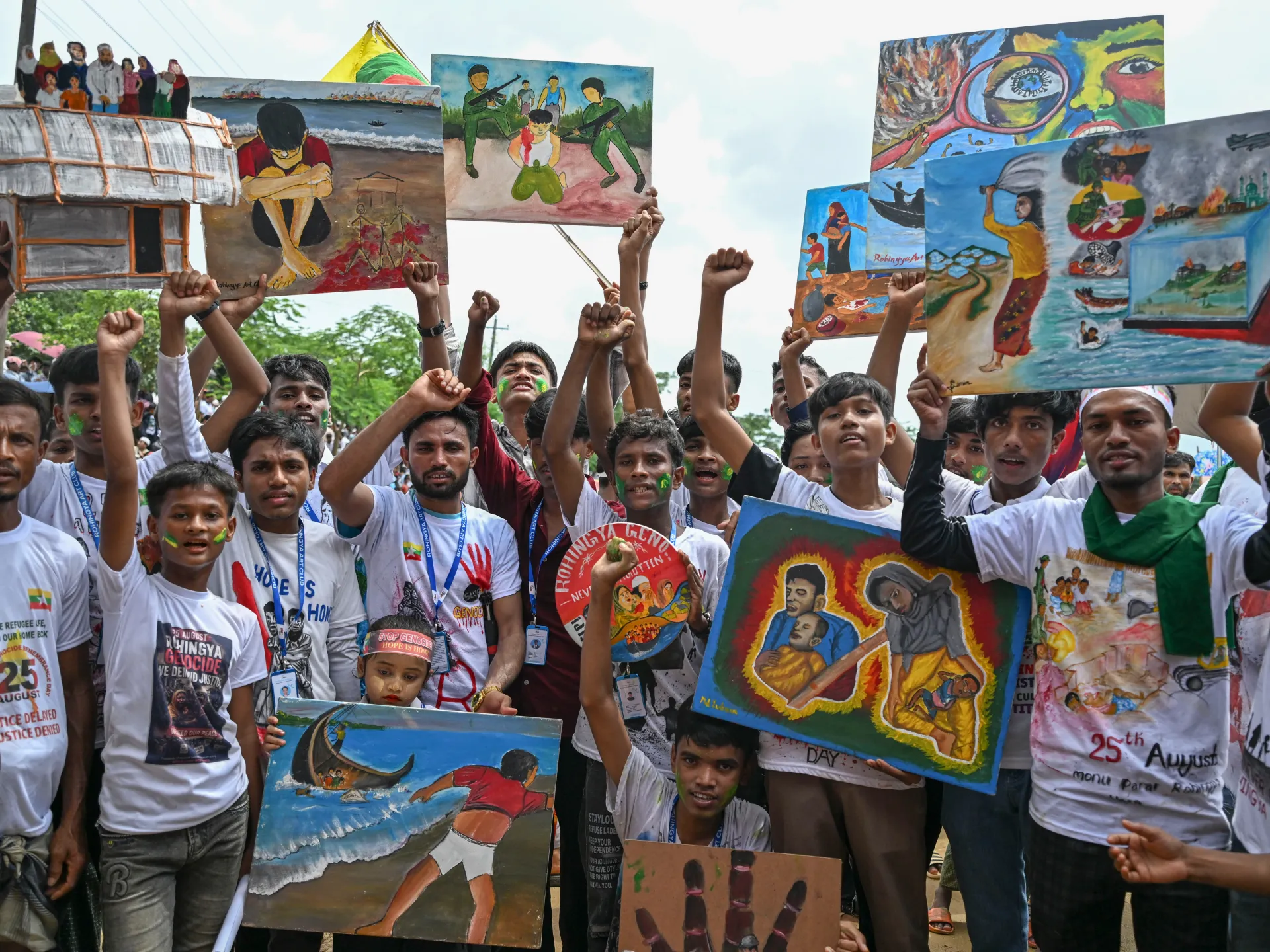 Photos: Rohingya refugees rally nine years after Myanmar exodus