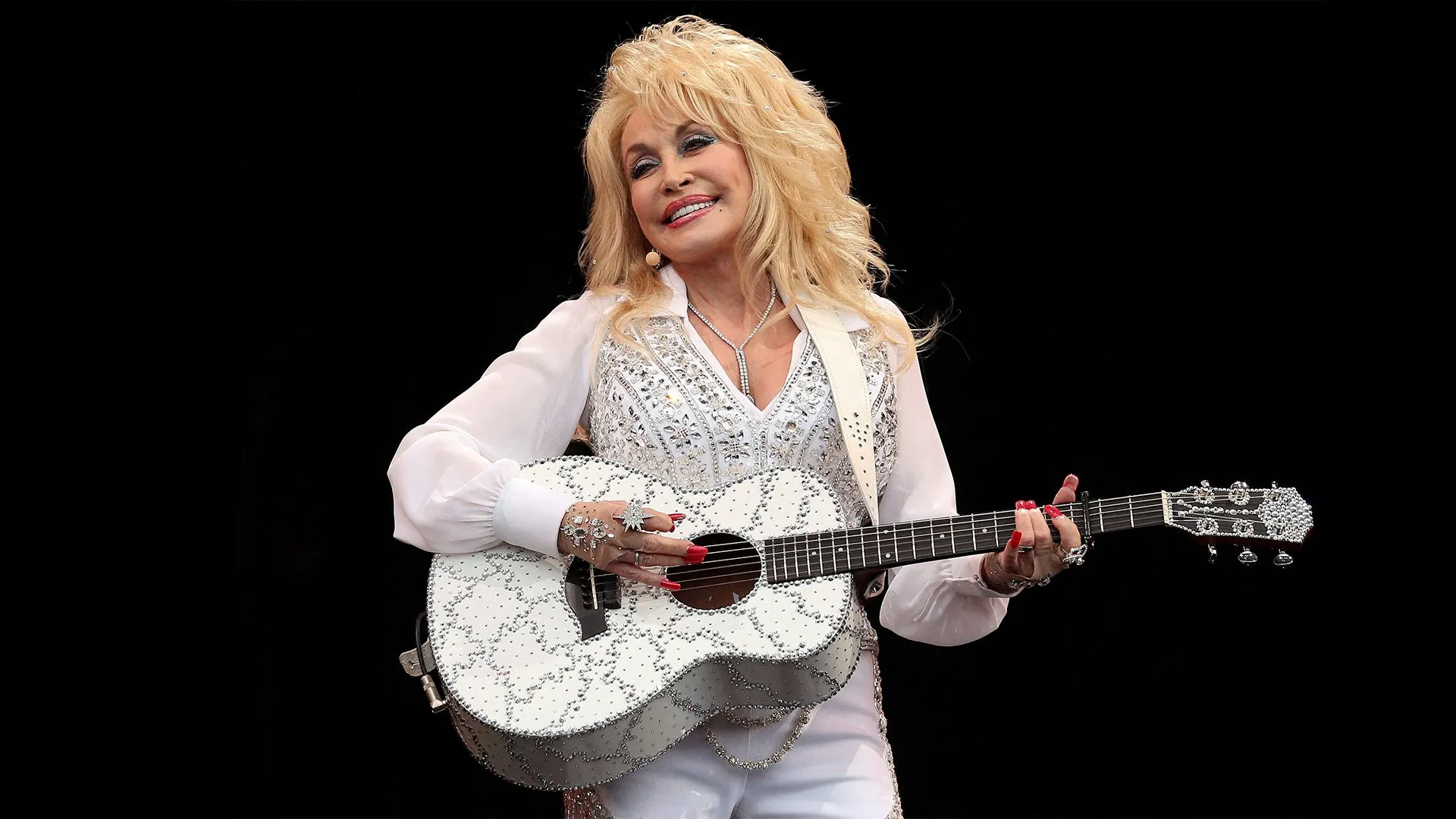 Who was the ‘Queen of Country’ Dolly Parton?