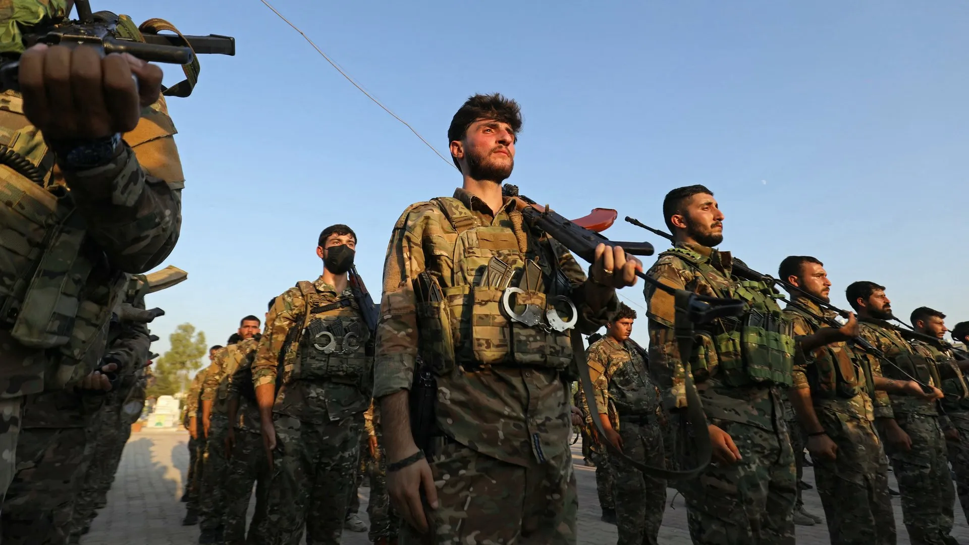 Who were the Syrian Democratic Forces and why dissolve?