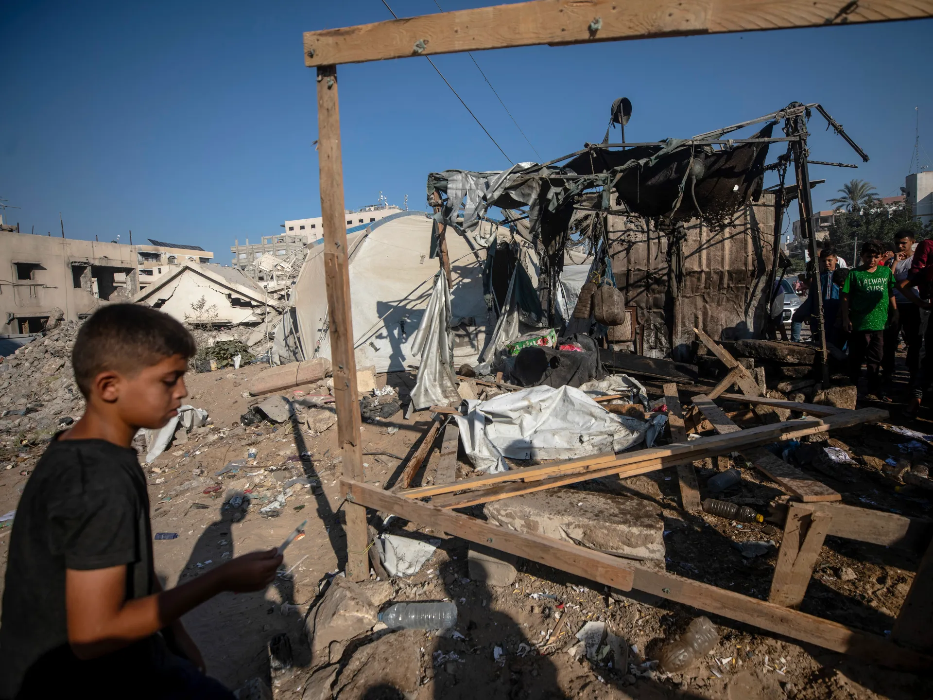 Three killed in strikes on Gaza as Israel renews threats over kite-flying