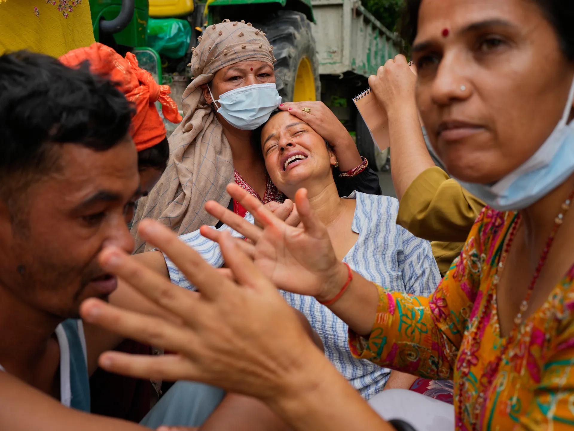 Nepal races to rescue trapped workers, as flood death toll surpasses 900