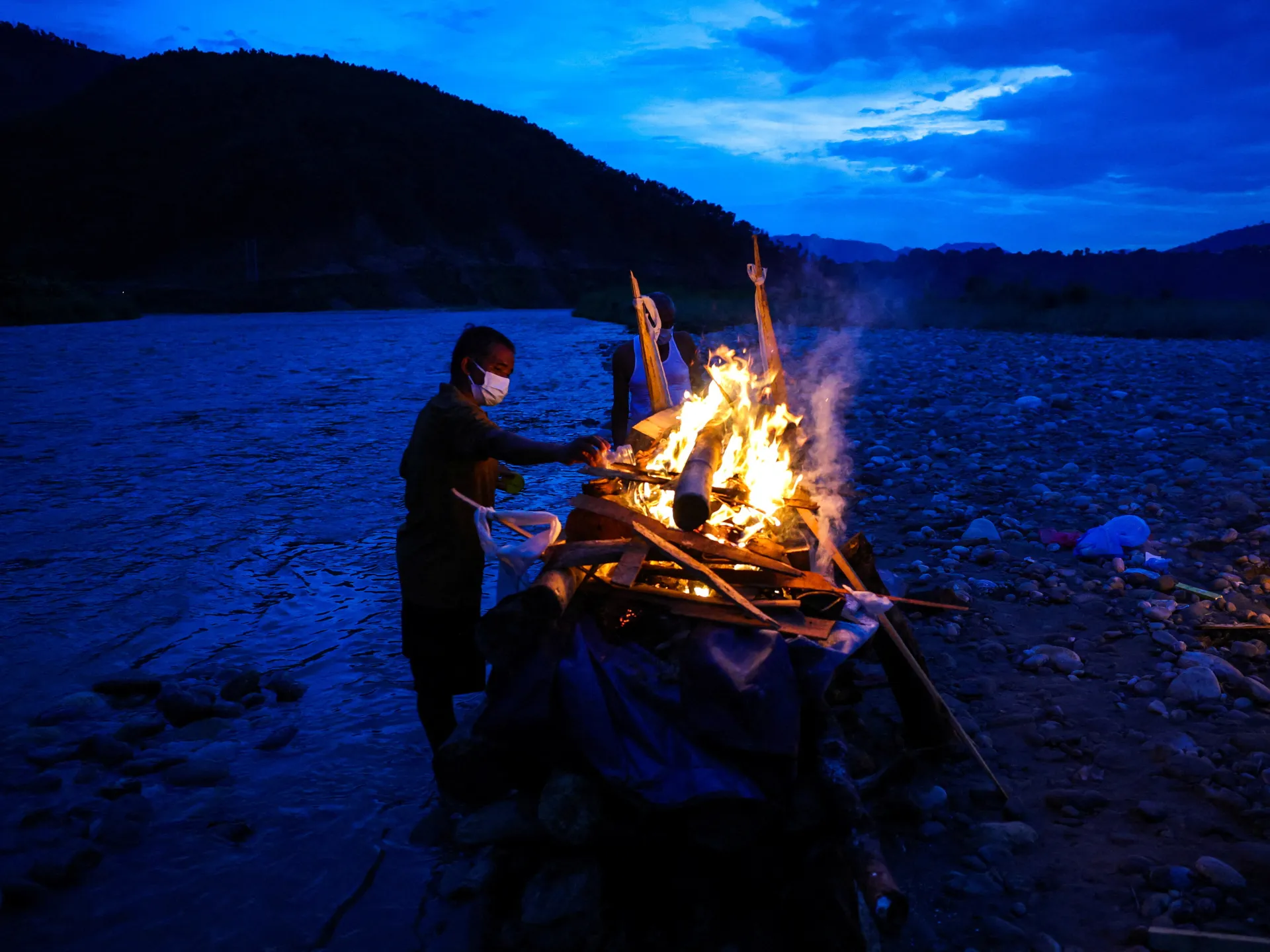 Photos: Nearly 1,000 dead, thousands missing in Nepal–China border floods