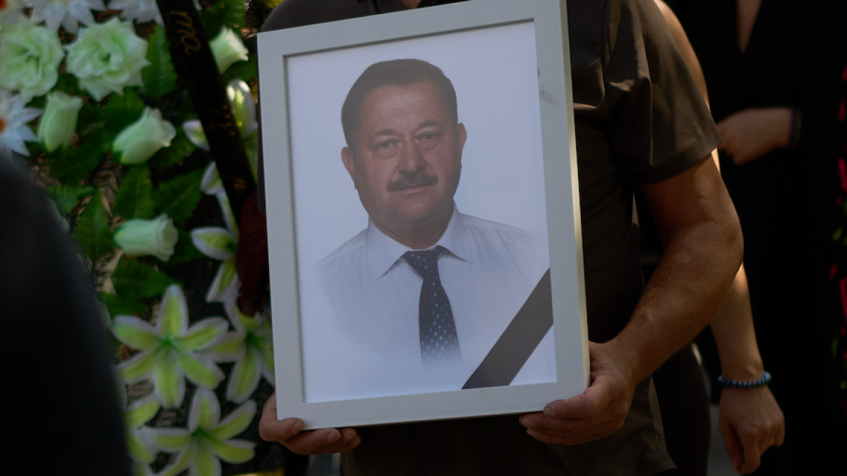 Ukrainians mourn community leader killed in Russian strike on Myla