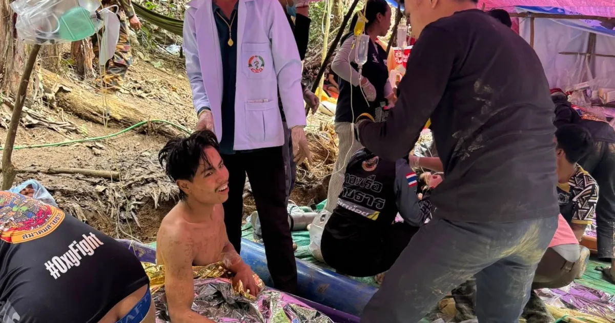 Rescuers free four more men from flooded Laos cave, two still missing