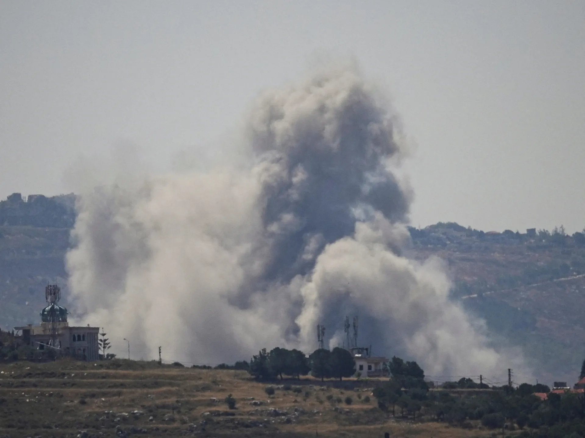 Israel kills 14 in southern Lebanon after trading fire with Iran