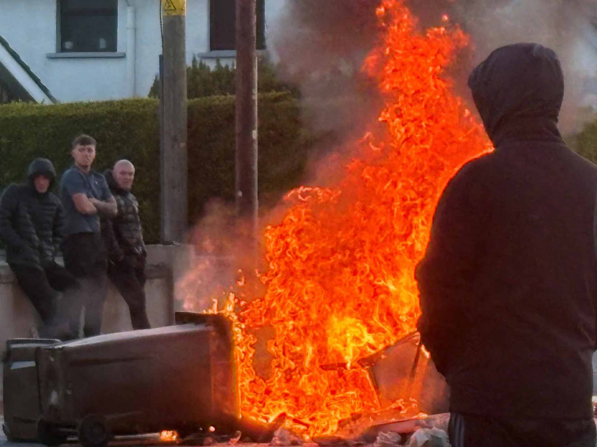 ‘Thuggery’: Belfast police fire water cannon at anti-immigration protests