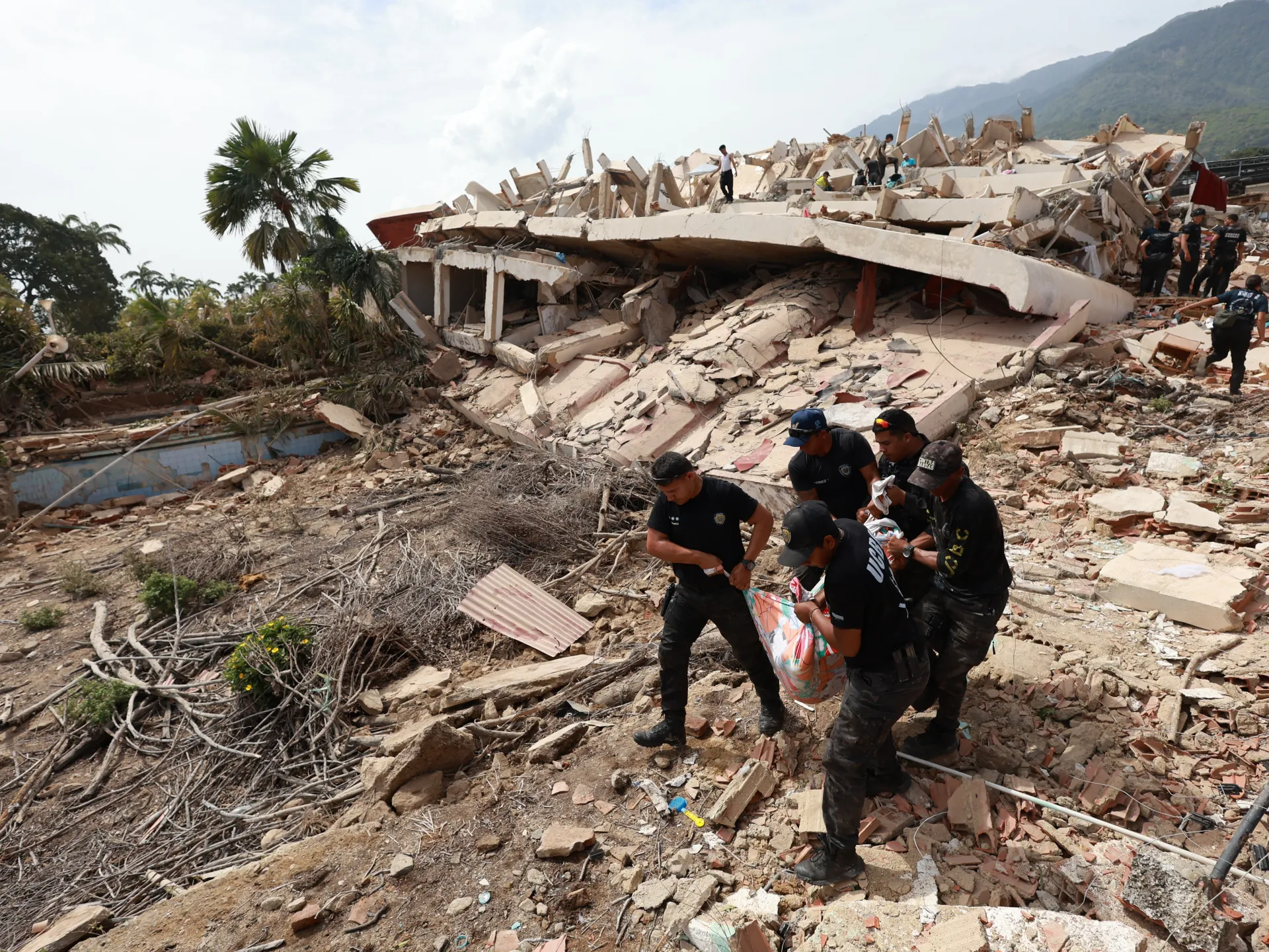 Hundreds trapped beneath buildings a day after Venezuela’s twin earthquakes