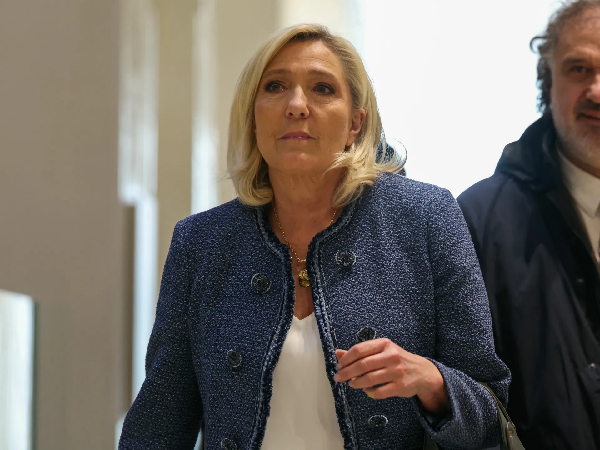 France appeals court opens door for Le Pen presidential run, with ankle tag