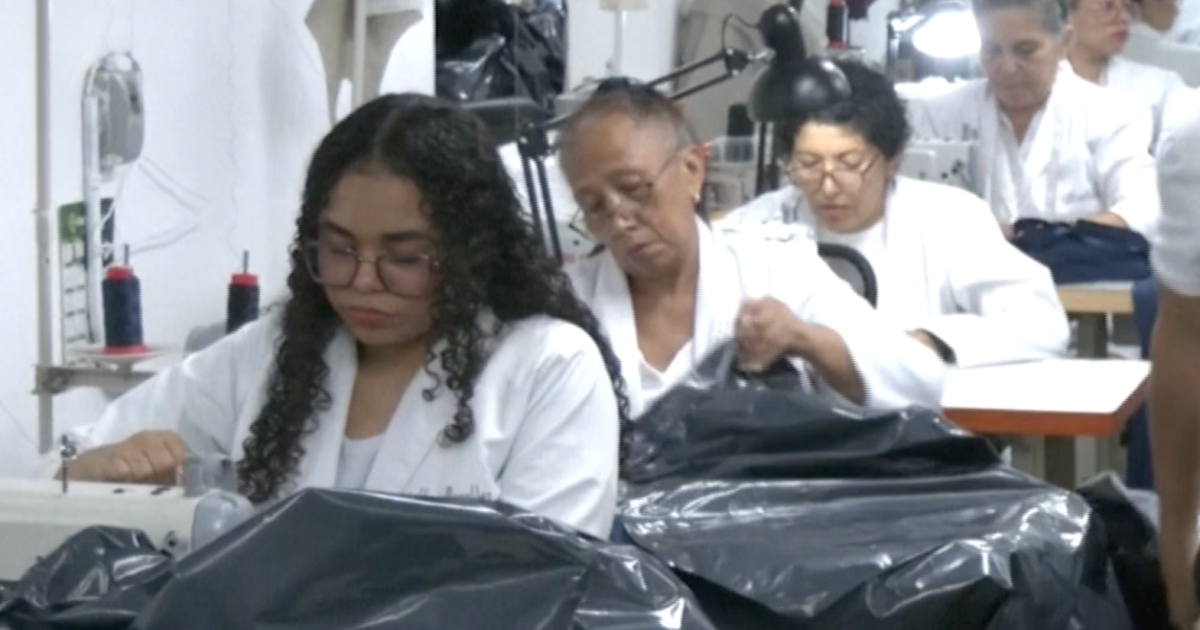 Venezuelan fashion designer swaps dresses for body bags