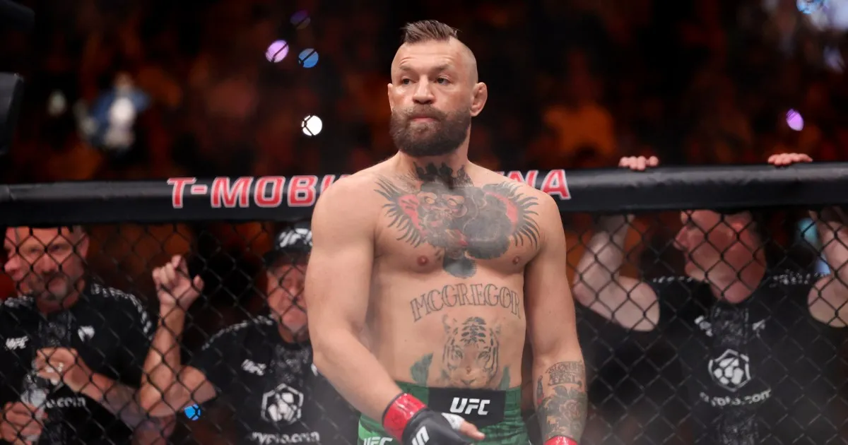 Injured Conor McGregor’s UFC comeback ends in defeat to Max Holloway