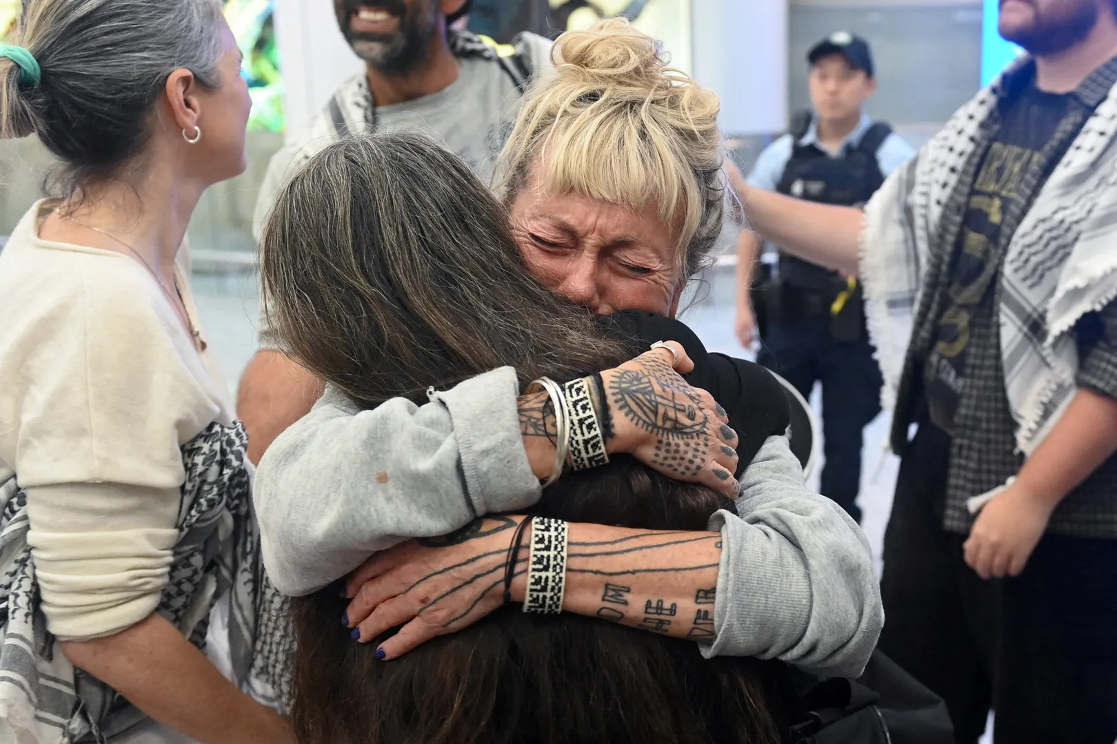 Gaza flotilla activists return to Australia, describing abuse