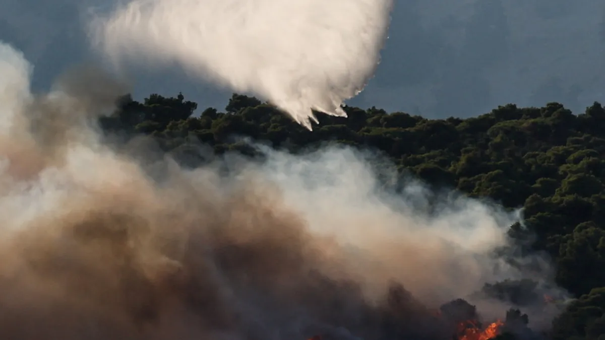 Greece battles raging wildfires as flames appear to ease in France
